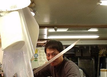Cutting up tuna at the Tsukiji Fish Market